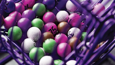 different colored balls with numbers on them